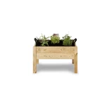 Fichero: huerto-bio-jardinera-madera-plantas-herbáceas.jpg.